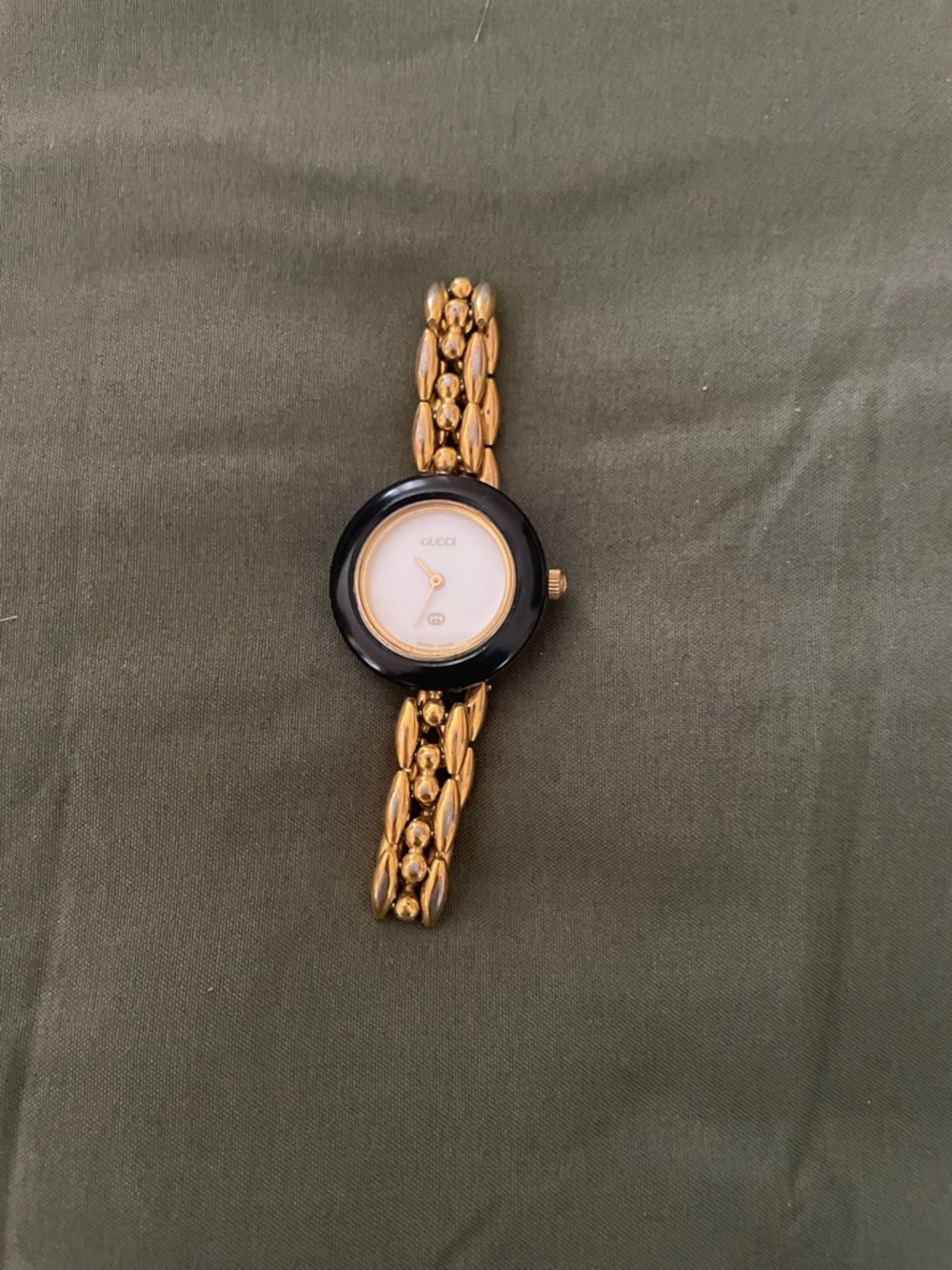 Gucci Gold-Tone Bracelet Watch with Black Bezel and White Dial